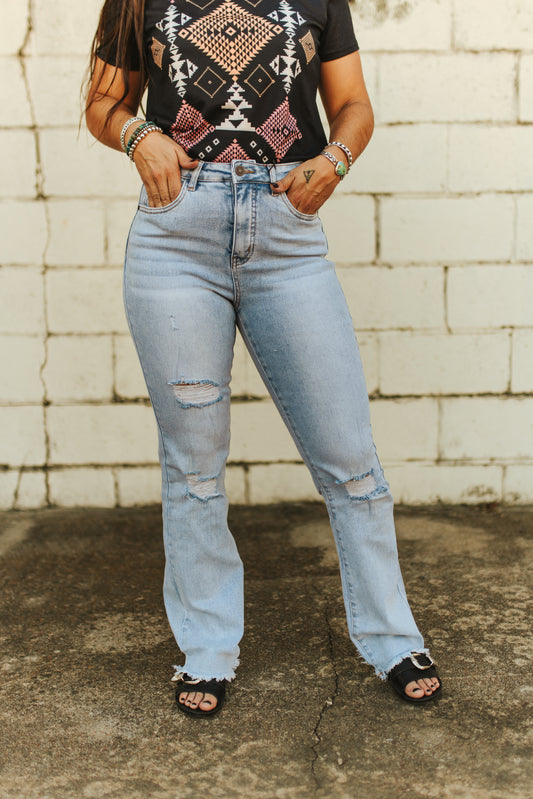 Light Wash High Rise Distressed Unfinished Hem Boot Cut Jeans (32in Inseam)